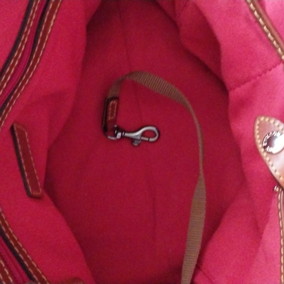 Dooney & Bourke medium satchel. Canvas w/leather trim. Key keeper. Used once. - Picture 5 of 6